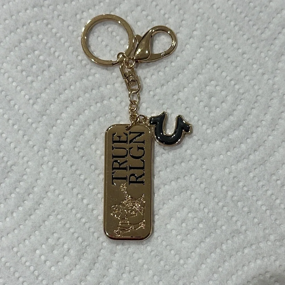 True Religion Gold and Black Keychain NEW